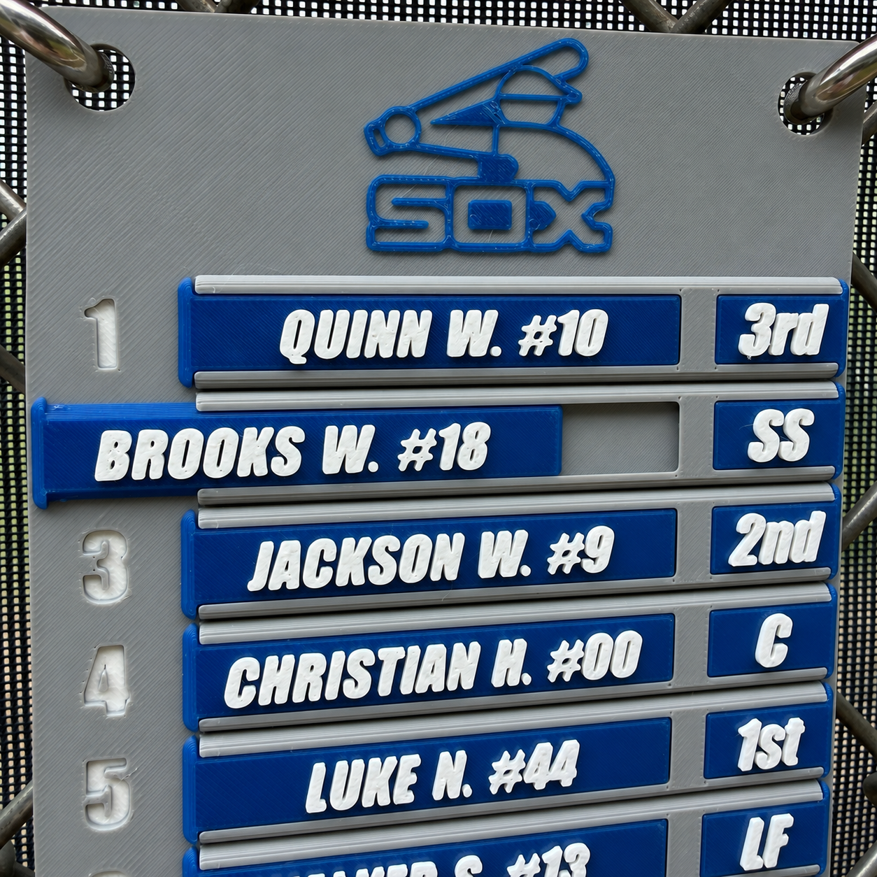 Square product photo of a gray and blue 4LifeTags custom baseball lineup board